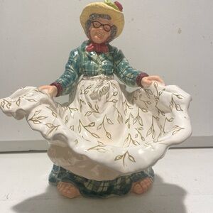 Blue Sky Clay-works Charming Old Lady with Hat,Glasses,and Apron.